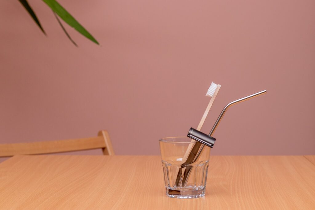 Bamboo toothbrush, metal razor and metal straw