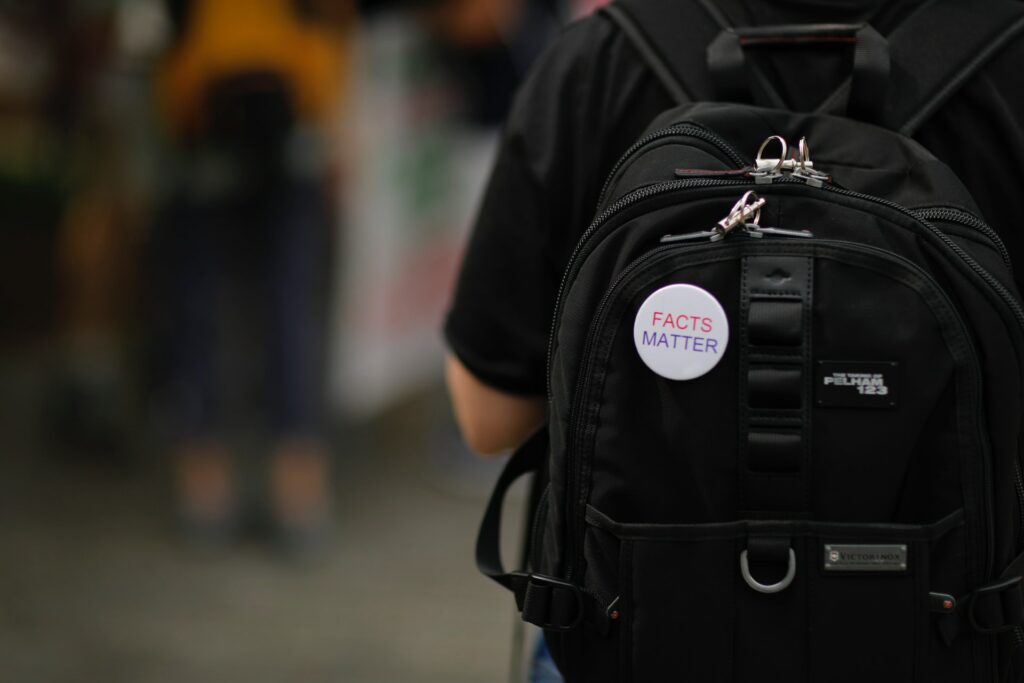 Badge that reads 'facts matter'