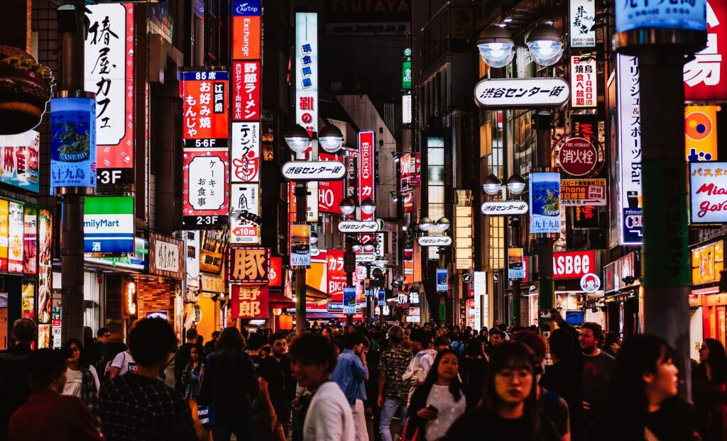 Busy shopping street at night