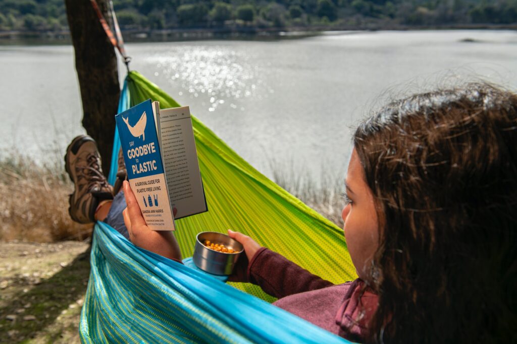 Woman reading in hammock