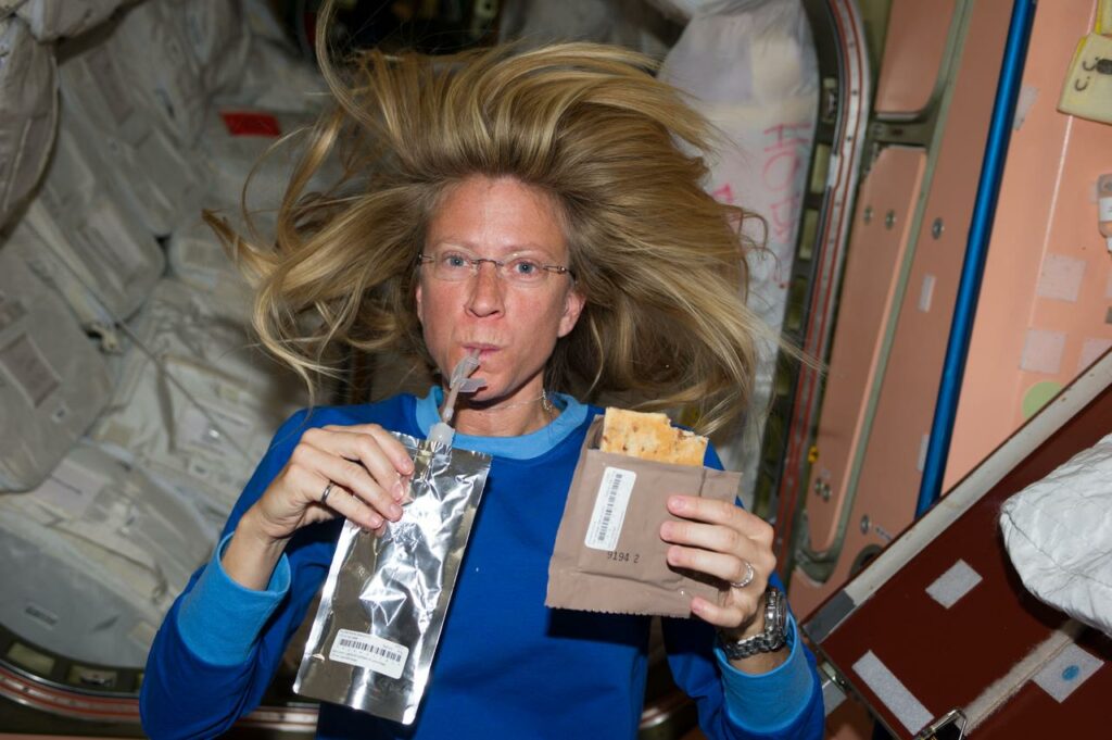 Astronaut eating in space